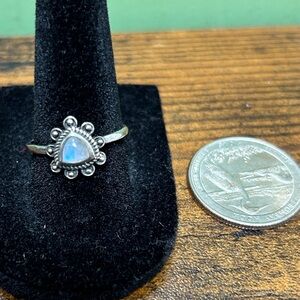 Petite vintage moonstone and marked sterling ring.